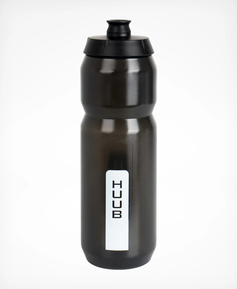 Pink HUUB 750ml sports water bottle with a sleek design and secure lid for hydration during workouts.