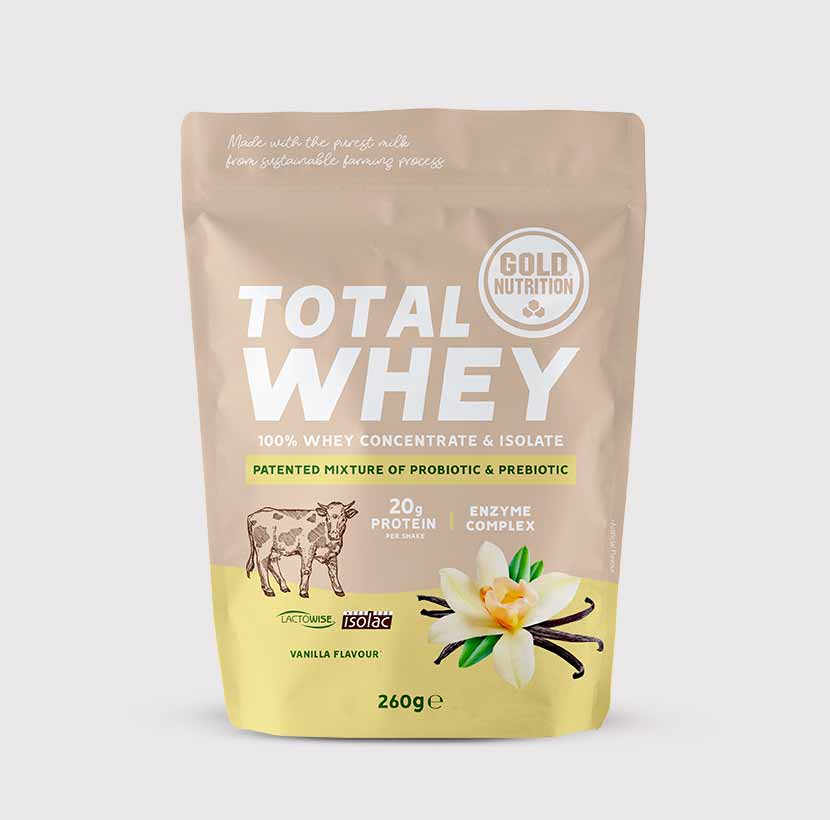 GoldNutrition Total Whey vanilla protein powder 260g jar with scoop and label showing flavor and brand branding.