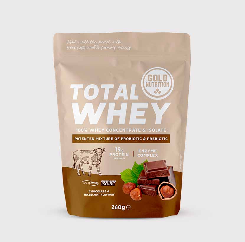 GoldNutrition Total Whey vanilla protein powder scoop in a 260g container, showing the product packaging.