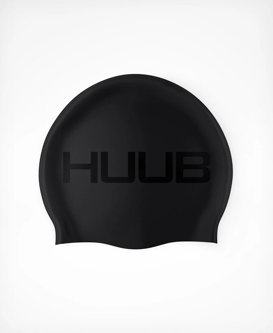 Bright orange HUUB silicone swim cap with a smooth, snug fit for comfortable swimming and waterproof protection.