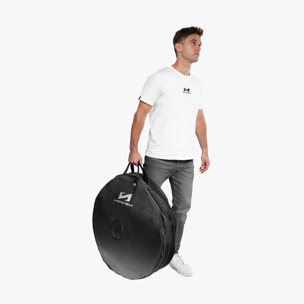 Scicon dual wheel travel bag with sturdy handles, durable fabric, and spacious interior for convenient luggage transportation.