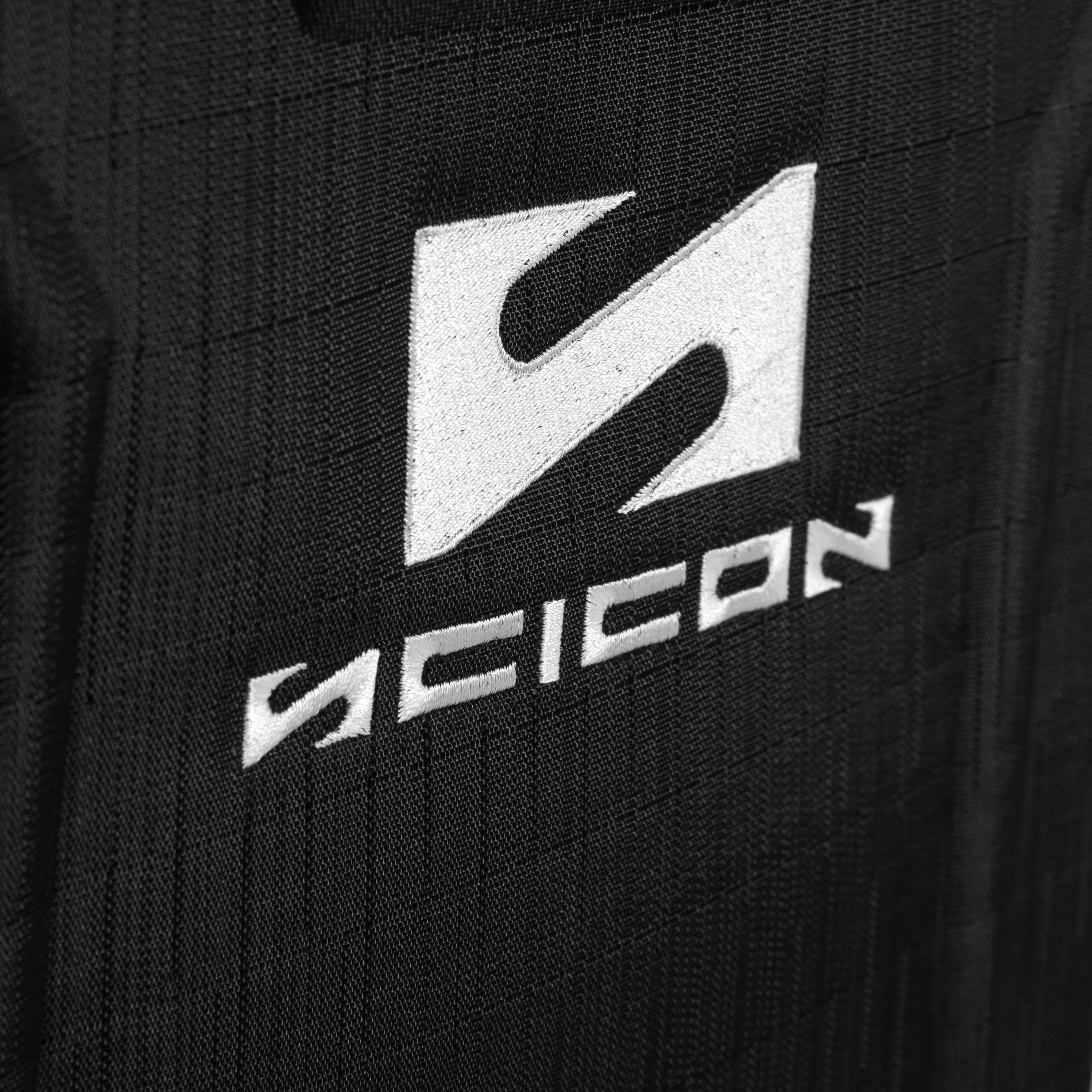 Scicon Podium Compact Sports Backpack 55L with multiple compartments and padded straps, designed for active and outdoor use.
